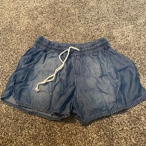 Size small stretchy jean looking shorts. Never worn